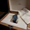 Omega Aqua Terra Worldtimer cadran bleu globe 24 fuseaux horaires