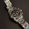 Rolex Cosmograph Daytona 16520 montre chronographe acier cadran noir
